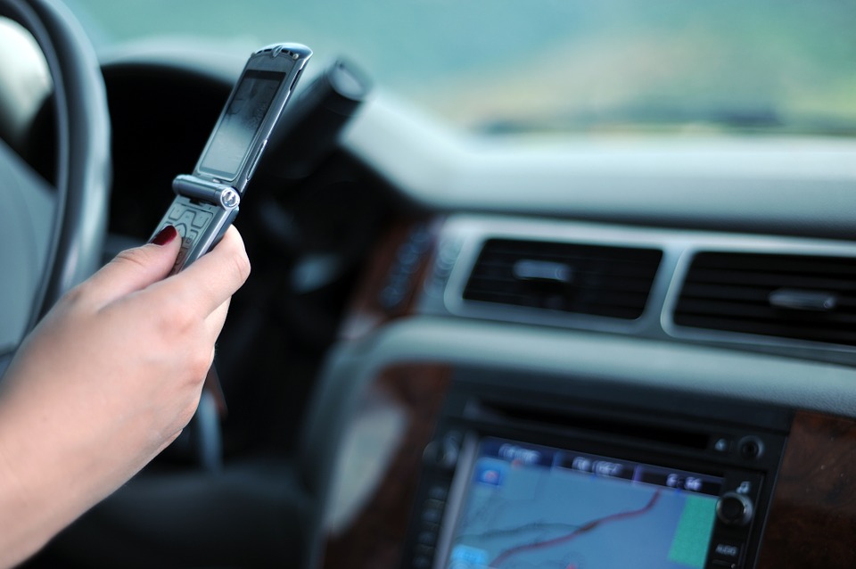 Anti-Distracted Driving Law: Penalties, Violations, and Exemptions